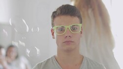 Teasing a handsome kid Stock Footage