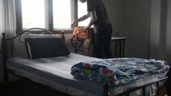 Young man traveler in the hostel Stock Footage