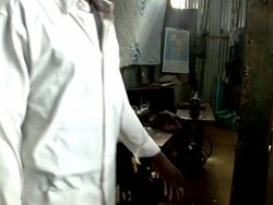 Man with sewing machine Stock Footage