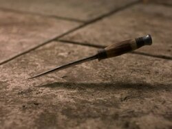 High speed Knife falling on pavement Stock Footage