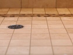 Residential Tiled Shower Drain with Running Water which Stops Stock Footage
