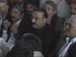 Mourners, Bhutto's husband, party spokesman Instructional Video