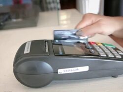 Women Swiping A Credit Card,Dolly Shot Stock Footage