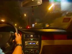 Driving a car at night in city, time lapse Stock Footage