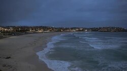 Bondi Beach at nightfall, Sydney Australia Stock Footage