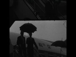 CAN 321 TYPHOON IN TOKYO AS THE OLYMPIC TORCH ARRIVES News Clip