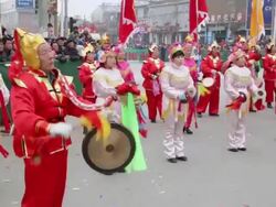 MS PAN Villagers performing gong and drum in traditional festive folk celebration or carnival during chinese spring festival  AUDIO  / xi'an, shaanxi, china Stock Footage