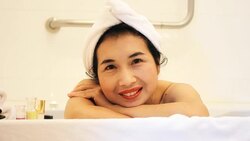 HD dolly:Young woman relaxing in the spa. Stock Footage