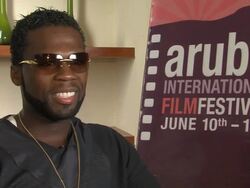 INTERVIEW 50 Cent aka Curtis Jackson on Dre and Eminem and more at the Aruba International Film Festival: Things Fall Apart Interview at Aruba . (Footage by WireImage Video/Getty Images Entertainment Video) Stock Footage