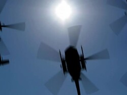 Helicopter silhouette in the sky. Seamless loop, HD Stock Footage