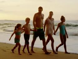 Family on a tropical beach vacation to Hawaii Stock Footage