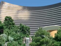 Wynn Resort lagoon garden bridge to casino in Las Vegas Stock Footage