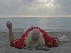 F/S big man w/ white long hair (Santa Claus), beard and moustache sleeping and hangover in the beach Stock Footage