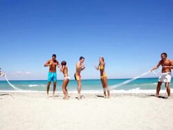 Group of a yong people jumping over the rope. Stock Footage
