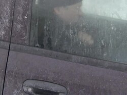 A blizzard traps a man in an SUV. Stock Footage