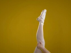 woman pointing toes in ballet class Stock Footage