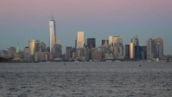 Statue of Liberty, One World Trade Center and Downtown Manhattan across the Hudson River, New York, Manhattan, United States of America Stock Footage