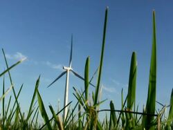 Wind Turbine and Grass on Bright Summer Day Stock Footage