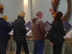 MS PAN Voters cast ballots at copmuter terminals during voting in presidential election / Monclova, Ohio, United States Stock Footage
