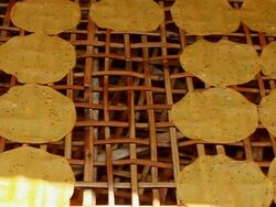 CU SLO MO Shot of cassava crackers on bamboo panel / Luang Prabang, Laos Stock Footage