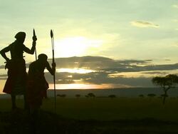 Long Shot - Massai tribesmen overlook an African savanna / Kenya Stock Footage