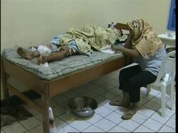 WRAP At least 339 dead, search for survivors, bodies in hospital, aerials News Clip