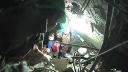 Hopes fade for those still trapped in ruins of collapsed building News Clip