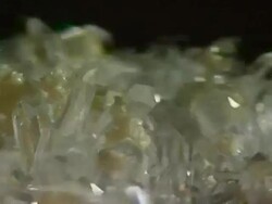Spinning crystals close up Stock Footage