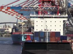 CU Shot of unloading containers in container ship on container terminal in harbour / Hamburg, Germany Stock Footage