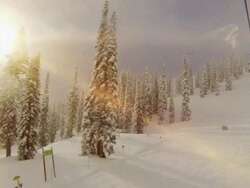 Sunshine on Ski Lift at top of Mountain Stock Footage