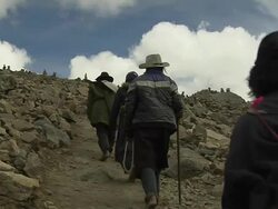 Block Shot People Performing Circumambulation towards Dolma La Pass Lhasa Tibet China  Stock Footage
