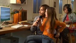 MS,  Father with two children  (8-9, 10-11)  playing and singing at home Stock Footage