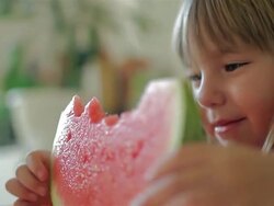 Little girl with watermelon Stock Footage
