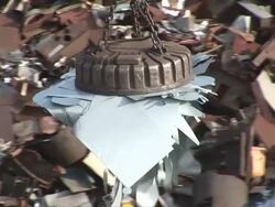 WS POV Magnet lifting steel scrap at scrapyard / Bous, Saarland, Germany Stock Footage