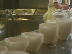 Unripened Cheese Filled into Cups Stock Footage