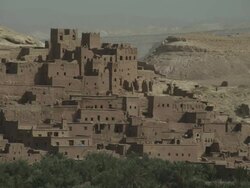 Rustic houses built into the expansive North African landscape. Stock Footage