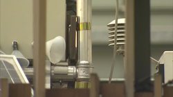 Traffic in central London and an atmospheric monitoring station News Clip