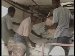 Food aid chaos in slum News Clip
