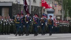 CLEAN : Ukraine rebels roll out banned tanks on WWII Victory Day News Clip