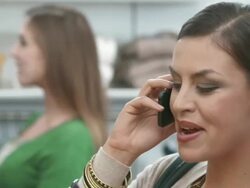 HD: Woman Talking On Phone And Shopping Stock Footage