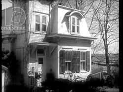 Edward Hopper painting in his studio, his wife Josephine Hopper also paints, shots of New York City. 1965 Stock Footage
