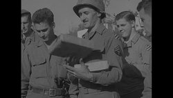 US soldiers in Italy during World War II get Christmas packages from home News Clip