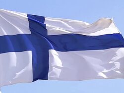 MS SLO MO Shot of Finland Flag Waving in Wind / Caen, Normandy, France Stock Footage