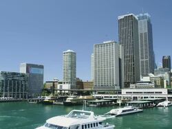 Ferry Boats leaving the Ferry Terminal of Circular Quay with the CBD Skyline, Sydney, New South Wales, Australia Stock Footage