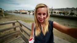 Young woman taking a selfie in Trouville harbour,Normandy-France Stock Footage