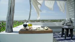 Appetizer on cutting board on luxury patio Stock Footage