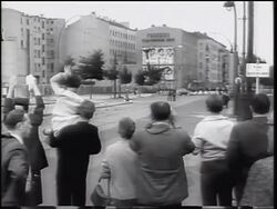 B/W 1961 REAR VIEW West Germans waving toward Berlin Wall at someone in East Berlin / Cold War Stock Footage