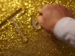 hand writing"top 3" on golden sand background Stock Footage