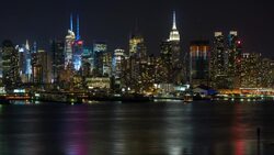 Manhattan, view of the Empire State Building and Midtown Manhattan across the Hudson River, New York, United States of America - Time lapse Stock Footage
