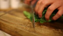chopping spinach Stock Footage